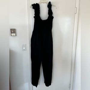 LOFT Black Sleeveless Jumpsuit with Relaxed Fit